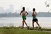 Runners in park full